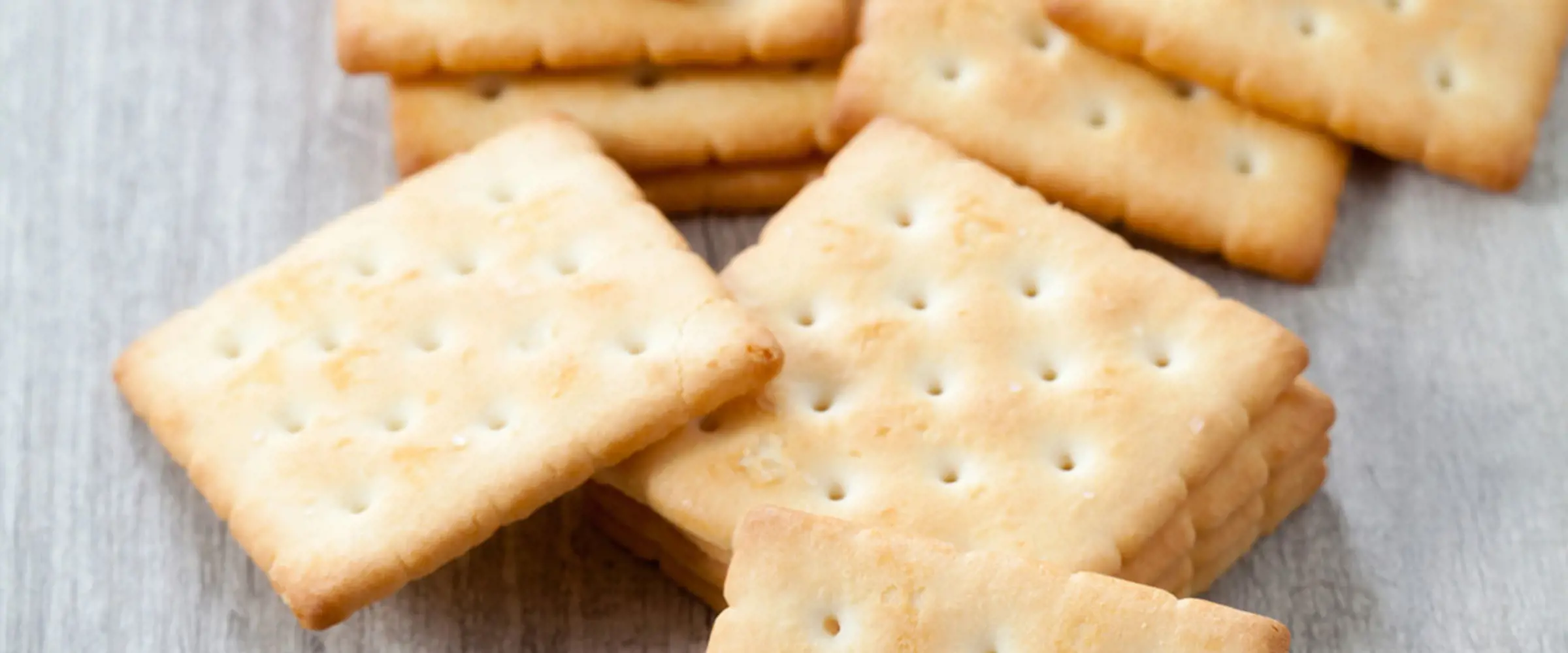 Improved crispness, stronger texture and protein enriched biscuits with whey ingredients